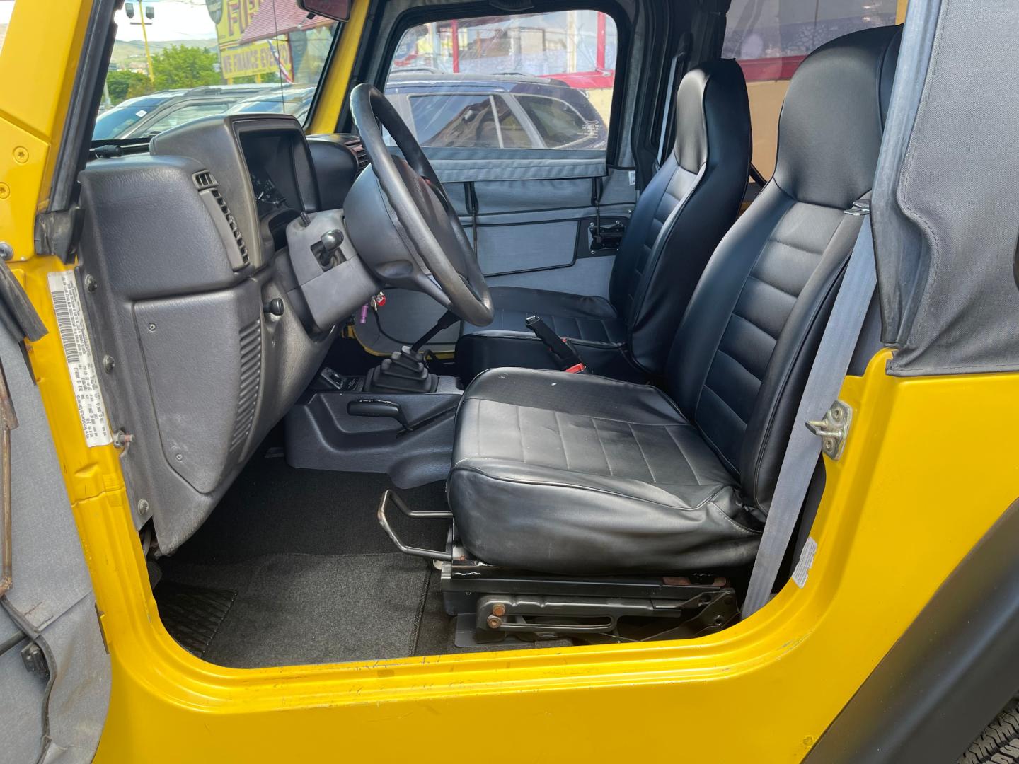 2000 Solar Yellow /Black Jeep Wrangler SE (1J4FA29P9YP) with an 2.5L 4 Cyl. engine, Manual transmission, located at 801 South State Street, Salt Lake City, UT, 84111, (801) 328-0098, 40.751953, -111.888206 - Wow extremely rare to find extra clean Jeep in immaculate condition 4x4! Low miles only 98,248 miles! Interior and exterior are both in excellent shape for the year. This is a clean title no reported accidents on the CarFax history report. It has passed emissions already and is ready to go. Featur - Photo#18